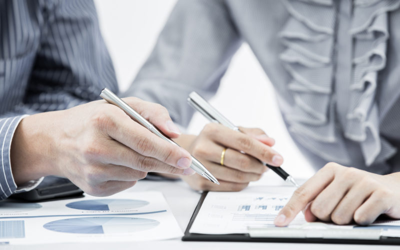 Executives Analyzing ROI Results From Lead Generation